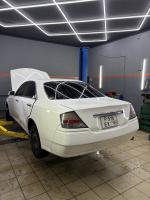 Ремонт стоек Nissan Cedric 2001 цвет белый